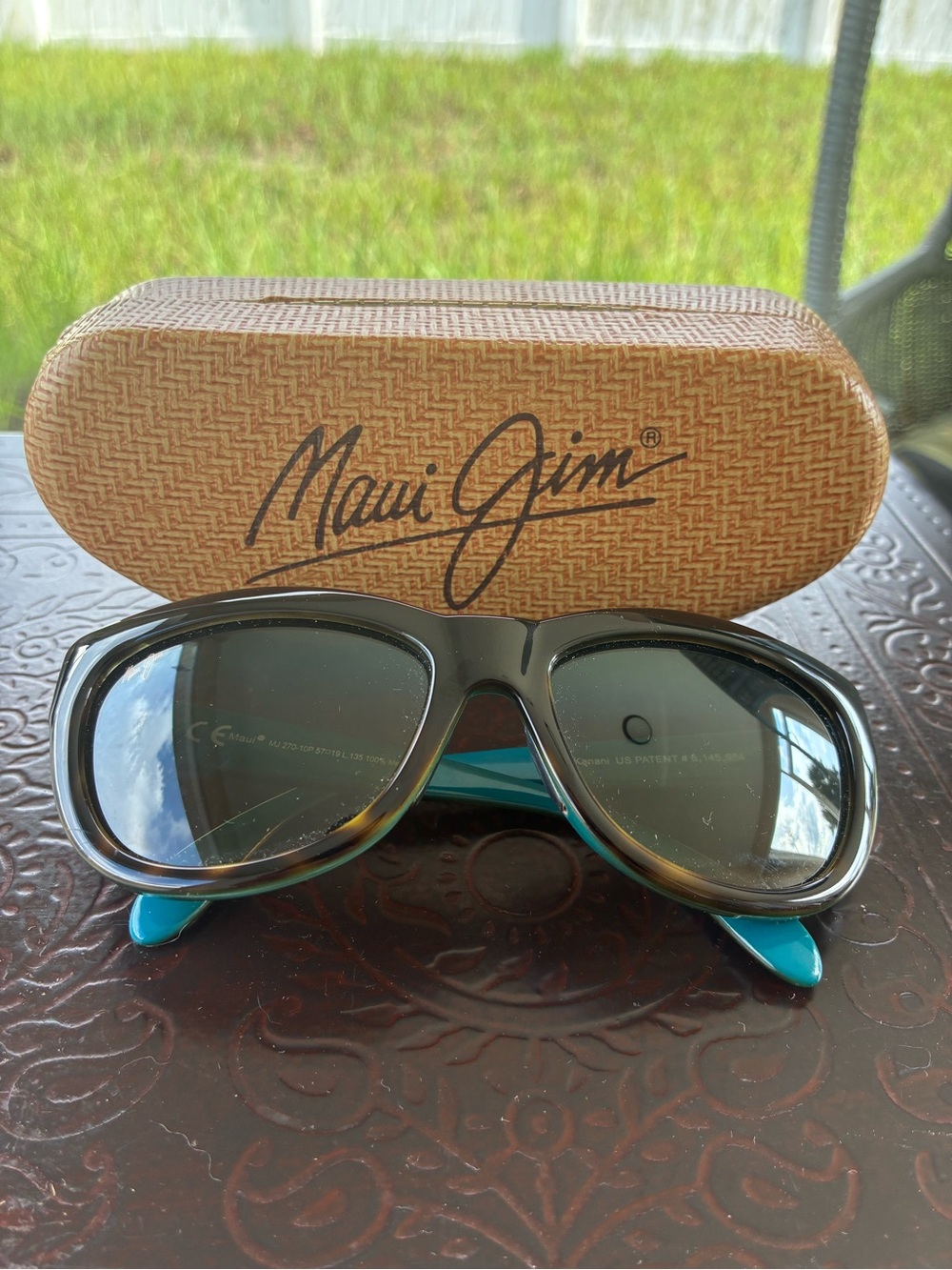 Maui Jim Tortoise Shell Sunglasses with Teal Temples